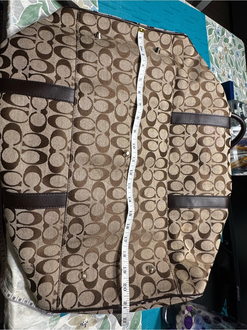 Coach duffle bag khaki/brown w/strap slight wear/tear. - Picture 13 of 14